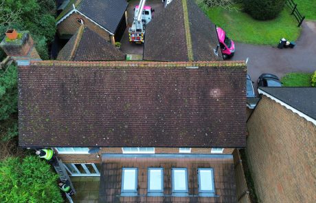 Multiple roofs at property before cleaning Multiple roofs at property before cleaning