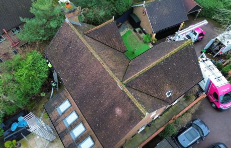 Multiple roofs at property before cleaning Multiple roofs at property before cleaning