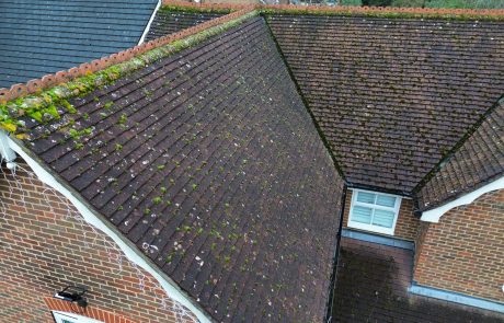 Mossy roof before cleaning Mossy roof before cleaning