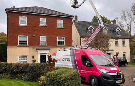 Simple Clean vans and cherry picker outside property Simple Clean vans and cherry picker outside property