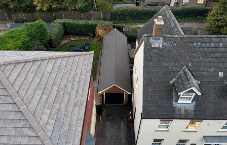 House and garage roofs after cleaning House and garage roofs after cleaning